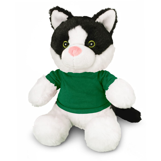 A black and white cat plush toy wearing a green shirt with bright green eyes and soft fur. It has a logo on the shirt.