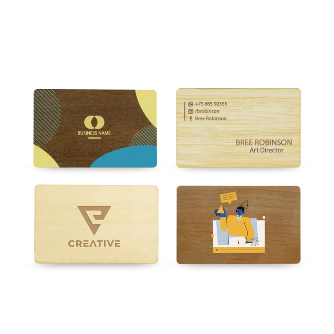 A collection of bamboo business cards, featuring different designs, colours, and a logo on one card.