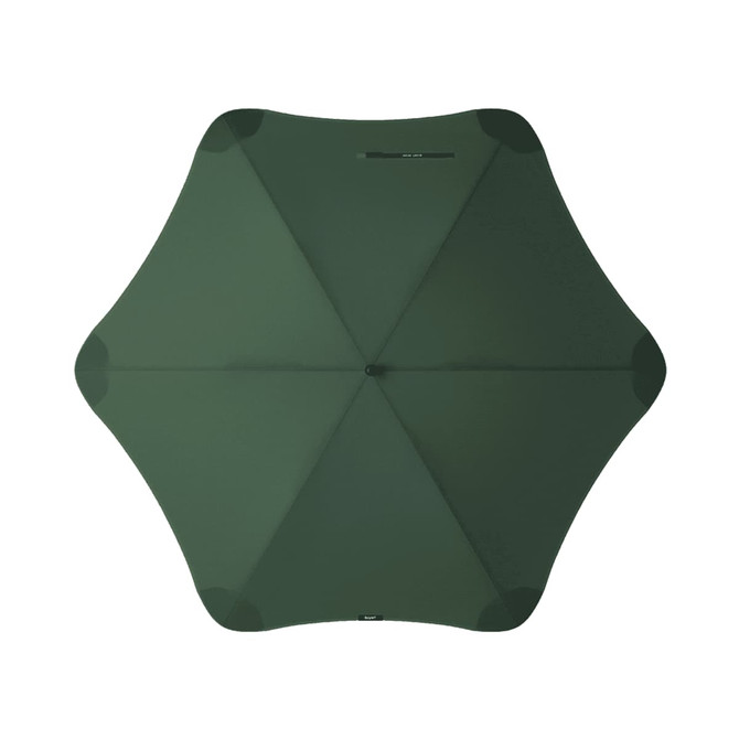 A green BLUNT Sport Umbrella with a unique octagonal shape and a central hub is displayed from above.
