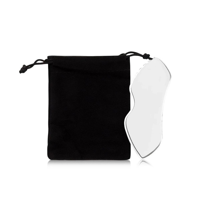 A clear Gua Sha board beside a black pouch, designed for health and beauty use.