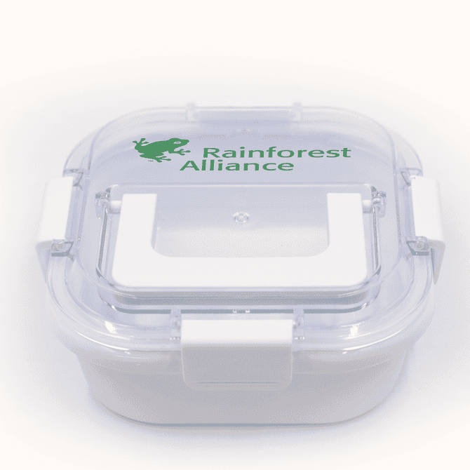 A white lunch box with a transparent lid, featuring a logo on the top. It has a secure clasp for closure.