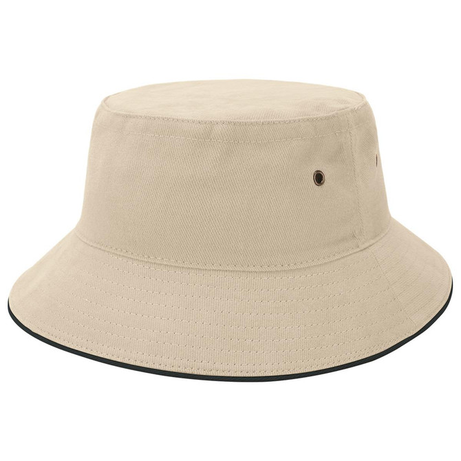 A beige bucket hat featuring a wide brim and eyelets, with a contrasting trim around the base.
