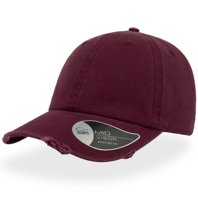 A maroon cap with a distressed design and a mid visor, featuring a logo sticker on the brim.