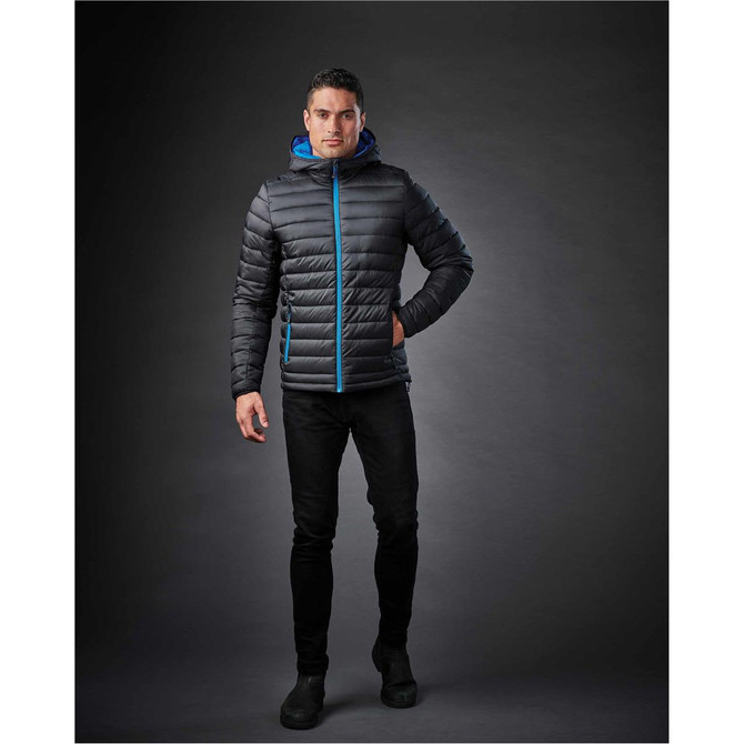 A men's thermal jacket in black with blue accents, featuring a hood and a zip front, displayed on a model.