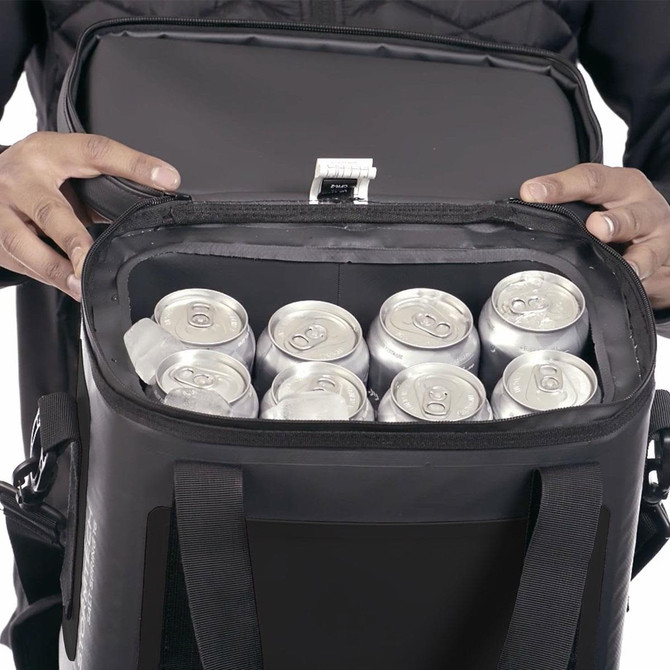 A black cooler bag held open, revealing several silver drink cans neatly arranged inside.