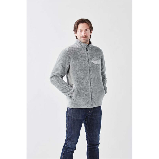 A men's grey Sherpa fleece jacket with a zip and side pockets, featuring a logo on the chest.