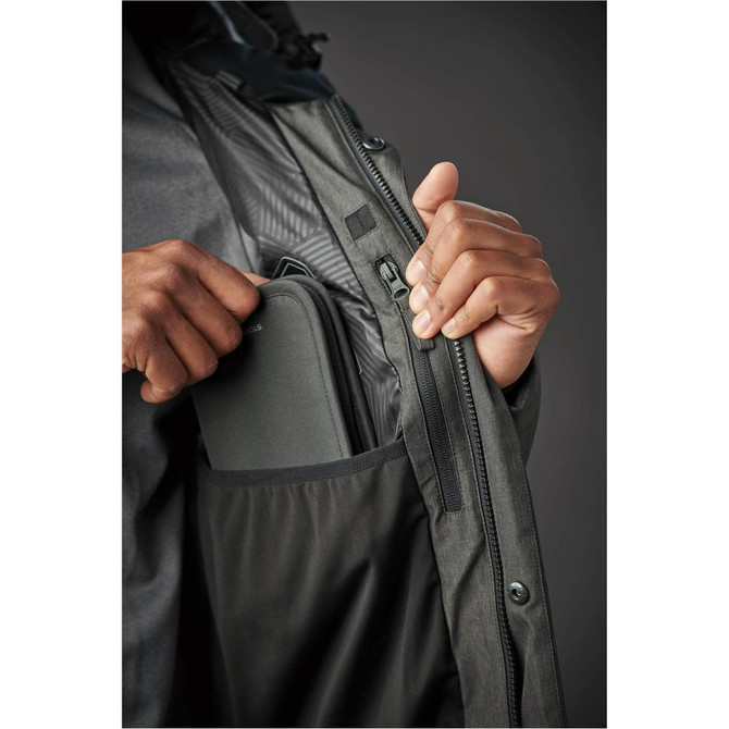 A green Men's Oslo HD Parka with a zippered pocket, featuring a hand holding a small item inside the jacket.