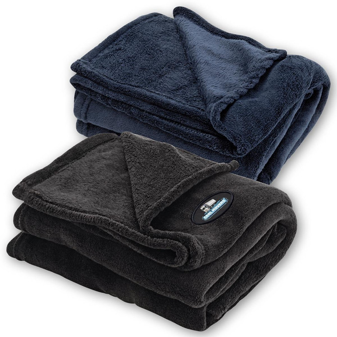 A folded coral fleece blanket in navy blue and a second in charcoal grey, both with a logo.