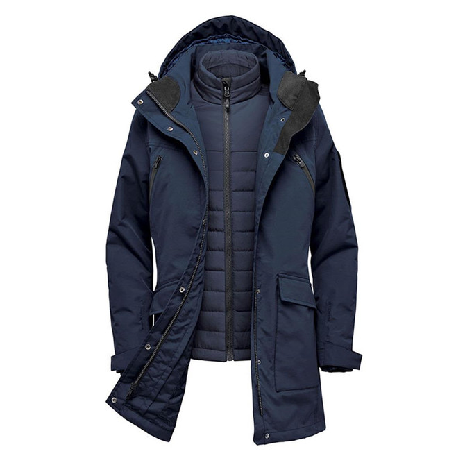 A navy blue 5-in-1 system jacket featuring a removable inner layer and an adjustable hood, with a logo on the sleeve.