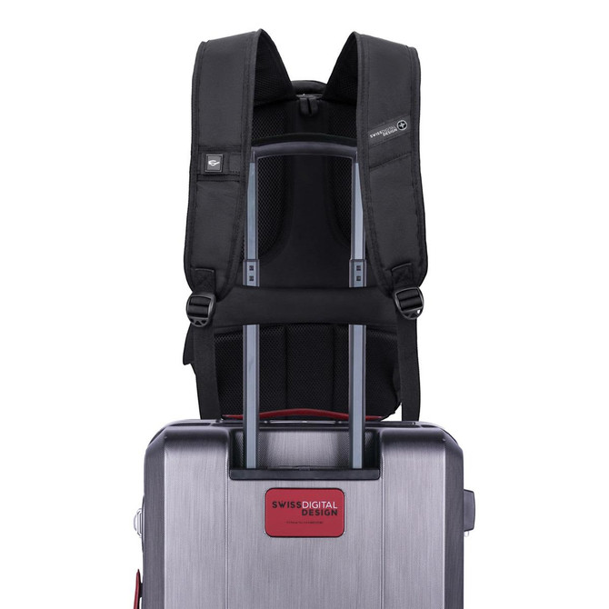 A black Swissdigital Pixel Backpack is attached to a silver trolley suitcase, featuring adjustable straps and a logo.