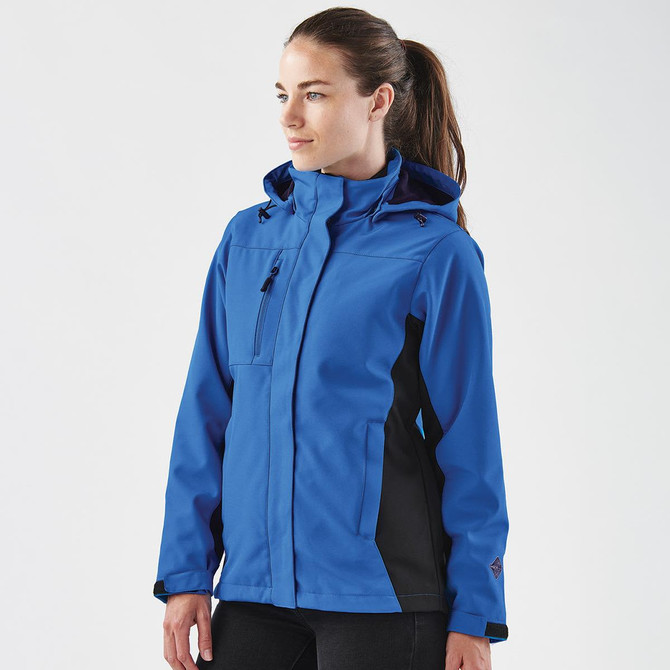 A blue and black women's jacket with a hood, featuring a logo on the sleeve.