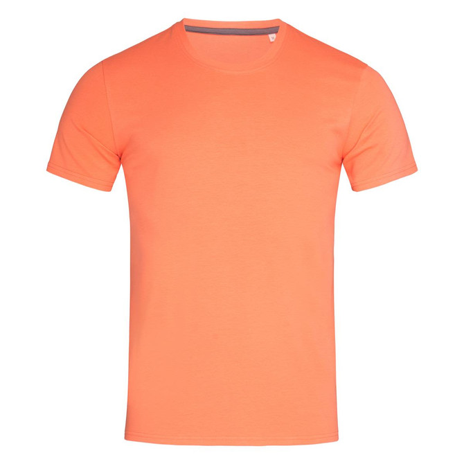 An orange crew neck t-shirt with short sleeves and a simple design. It features a subtle logo.