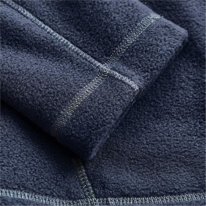 A close-up of a navy fleece jacket, highlighting the textured fabric and stitching details. It features a logo.