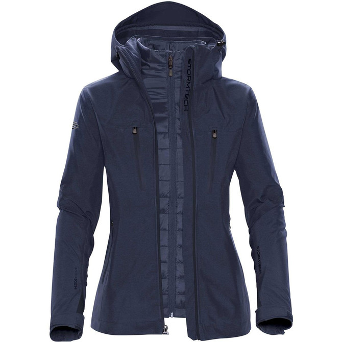 A navy women's jacket featuring a hood, zippered front, and two zippered pockets. It includes a logo on the sleeve.