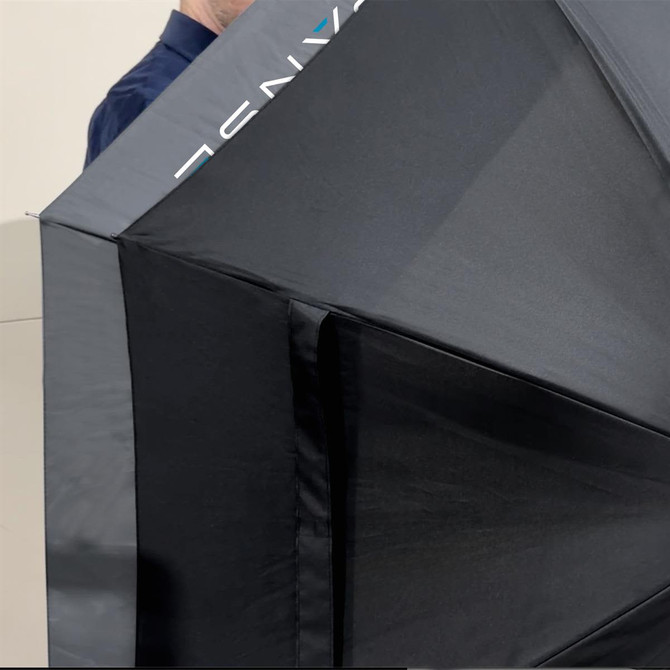 A black umbrella with a sleek design, partially opened, featuring a logo on one side.