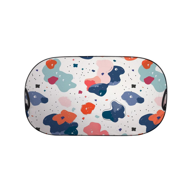 A light-blocking car sun shade featuring a multicoloured abstract pattern with blue, pink, and orange shapes.
