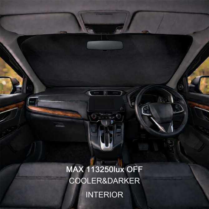 A light-blocking car sun shade in black, fitted on the interior of a vehicle, covering the front windshield.