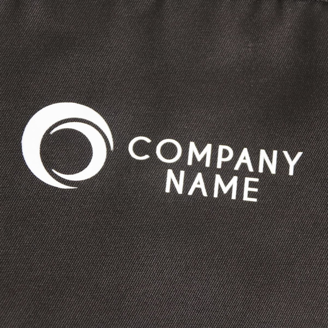 A black apron made from 100% polyester, featuring a pocket and a logo.