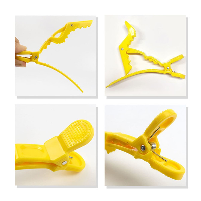 A yellow anti-slip positioning alligator clip with a textured grip and adjustable design, featuring a logo.