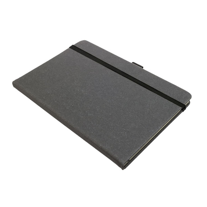 A recycled leather notebook with a hard cover, featuring a black elastic band for closure.
