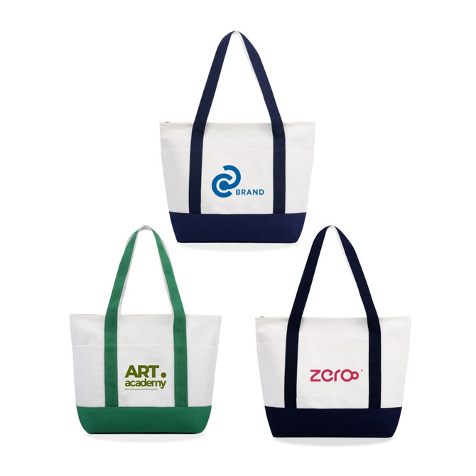 Three medium canvas tote bags in white with navy and green accents, featuring logos on the front.