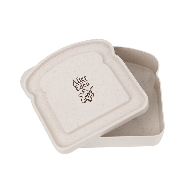 A portable lunch box in a light beige colour, featuring a bread-shaped design and a logo.