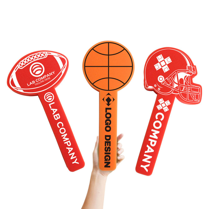 Three red sponge ball cheersticks in the shapes of a football, basketball, and helmet, featuring a logo on one.