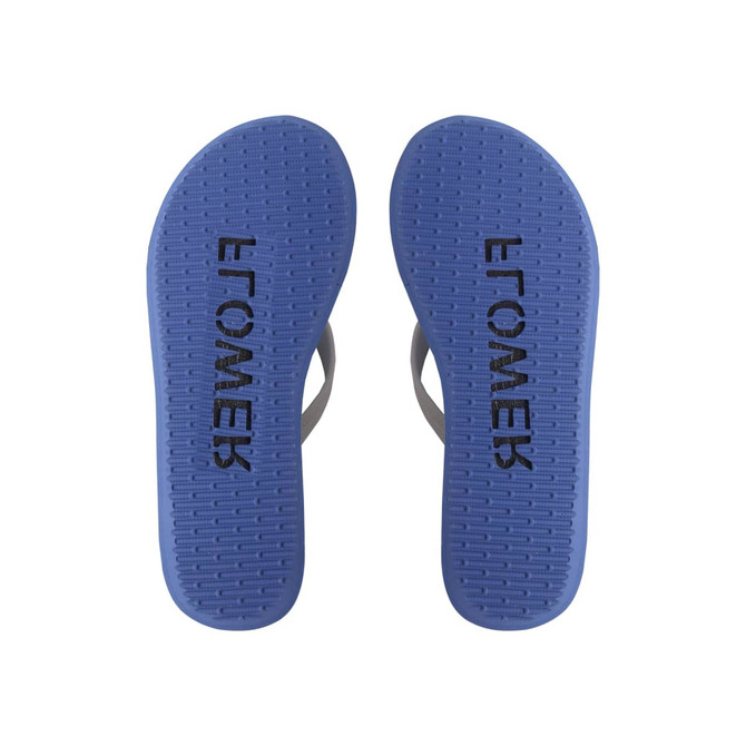 A pair of blue rubber thongs with a textured sole, featuring a branding logo on the footbed.