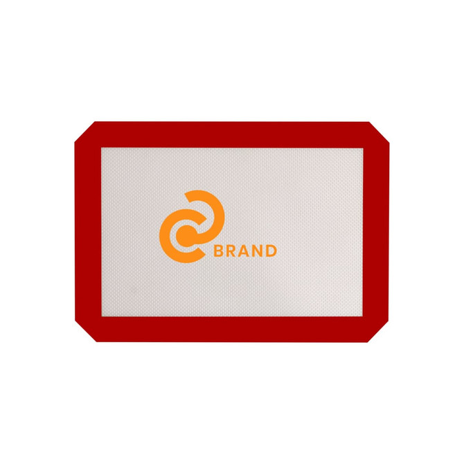 A silicone baking mat with a red border and a logo in the centre. The mat is predominantly grey.