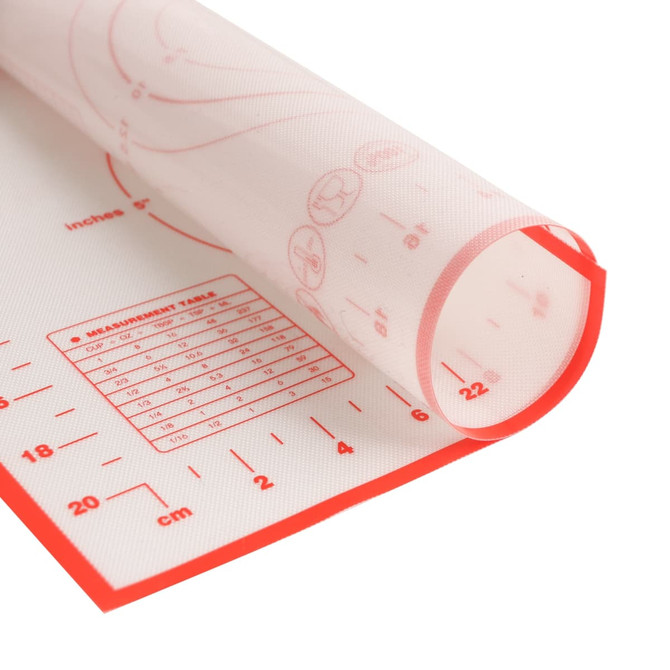 A silicone pastry mat in white with red edges, featuring measurement markings and a branding logo.