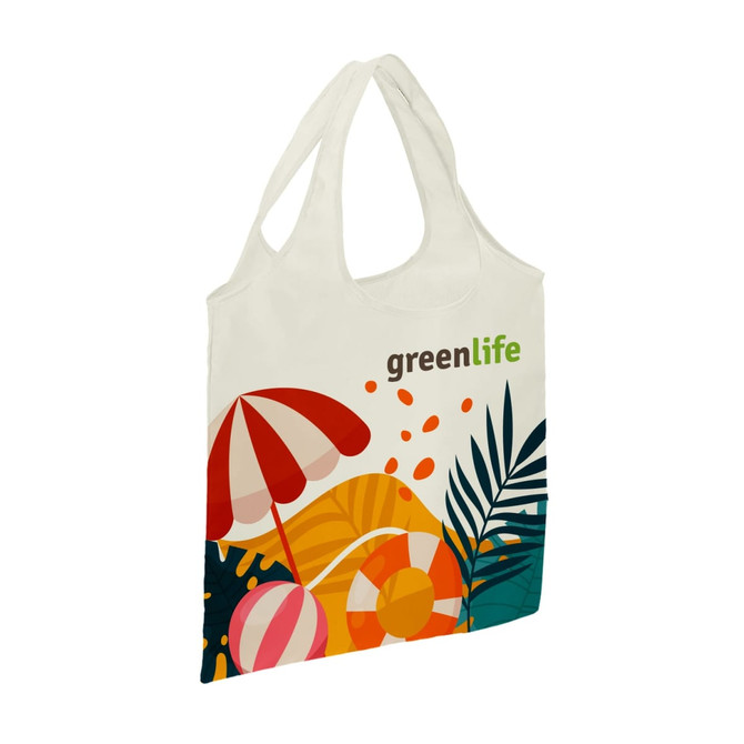 A foldable shopping bag in cream featuring a colourful beach design and a logo.