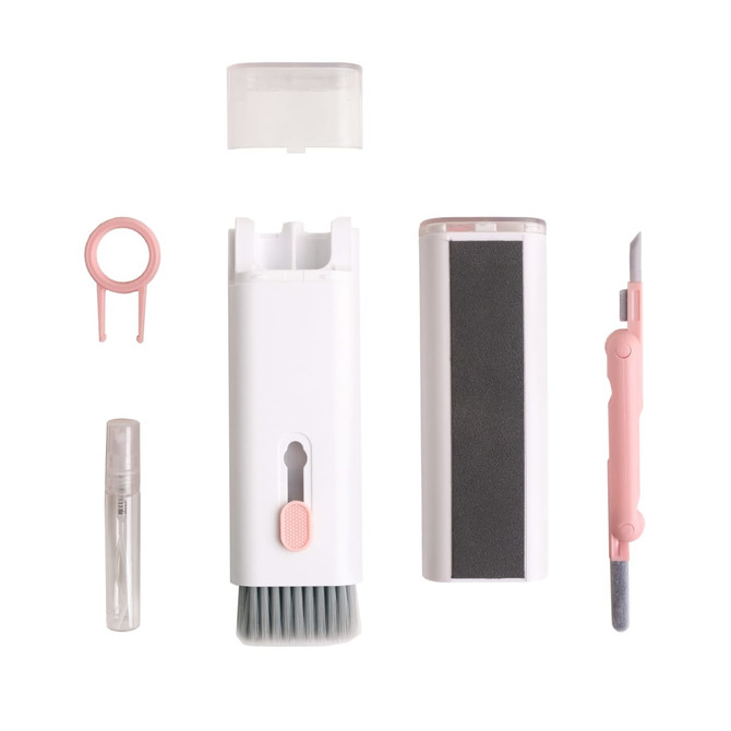 A 7 in 1 cleaning kit featuring white and pink components, including a brush, scraper, spray bottle, and two additional tools.