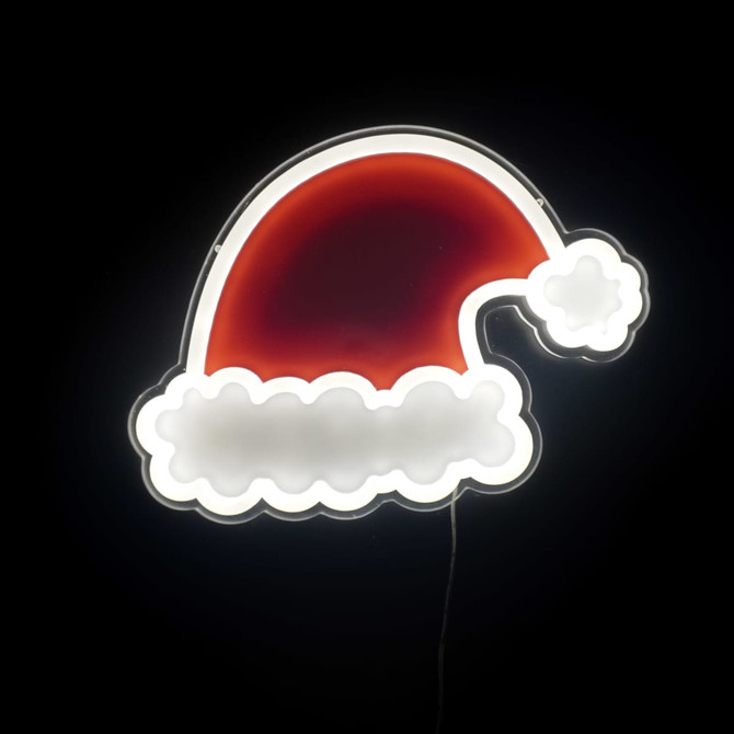 A red and white neon LED sign shaped like a Santa hat, illuminated against a dark background.