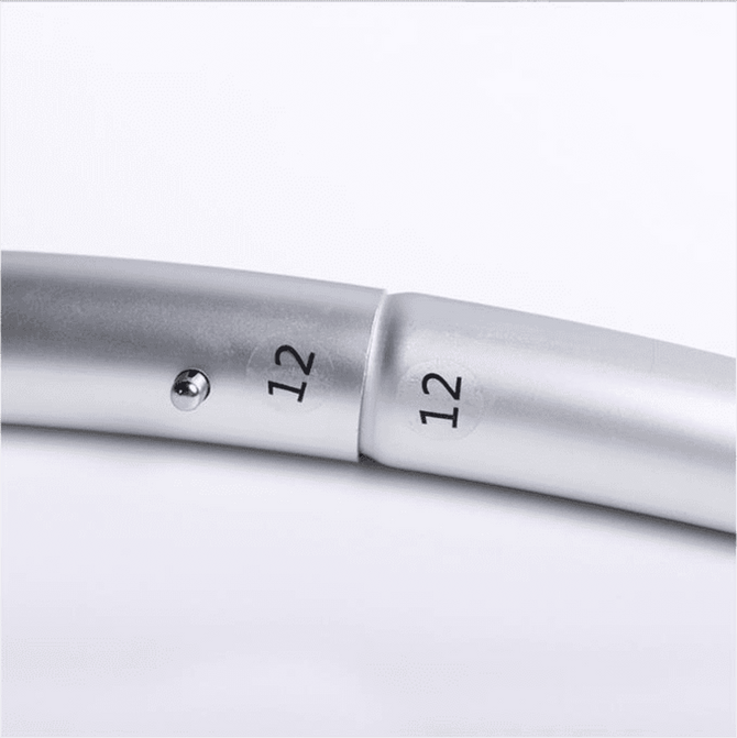 A silver circular frame showing connectors, with the number "12" printed on it. The frame has a metallic finish.