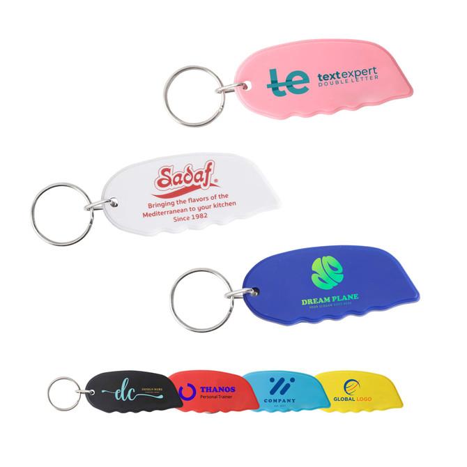 A selection of Mini Cutter Keyrings in pink, white, blue, and black, each with a keyring attachment and a logo.