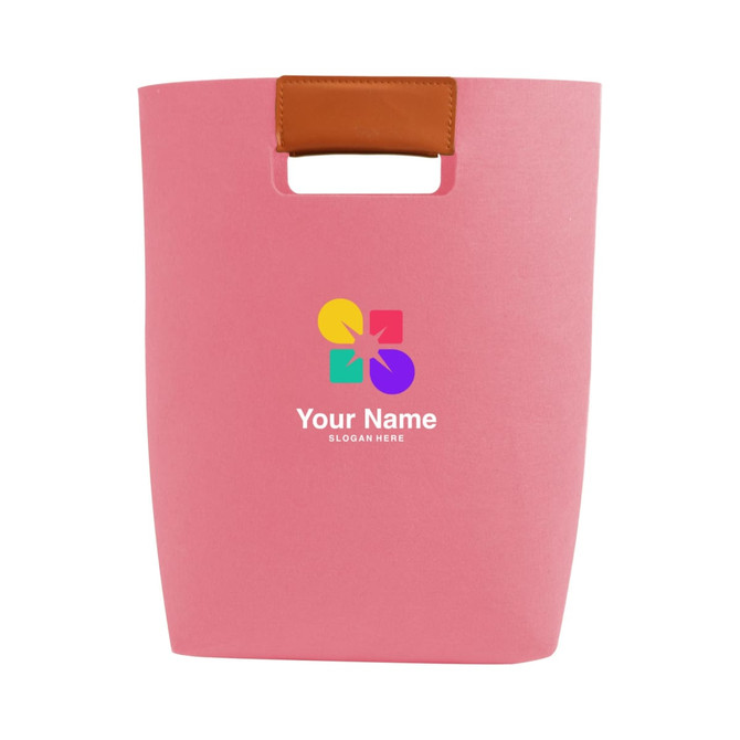 A pink felt tote bag with a tan handle and a multicoloured logo on the front.