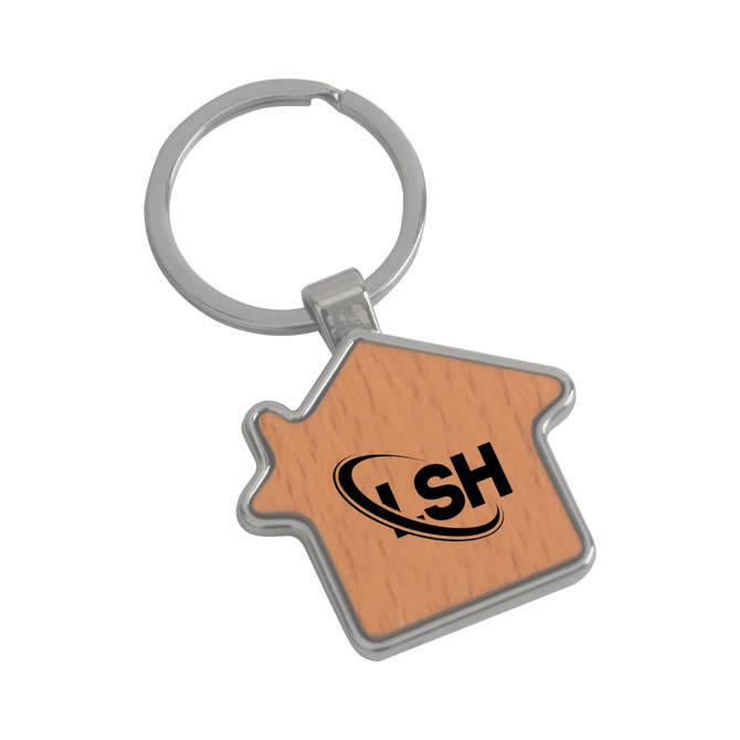 A wooden keyring shaped like a house with a silver metal frame and a logo on the wooden surface.