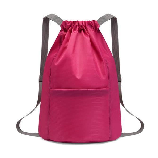 A pink bucket drawstring backpack featuring a front pocket and grey straps, with a branded logo.