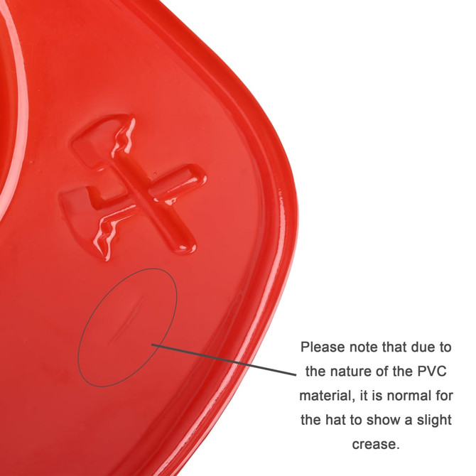 A red PVC fire chief hat with a slight crease visible on the surface. It has a logo on the side.