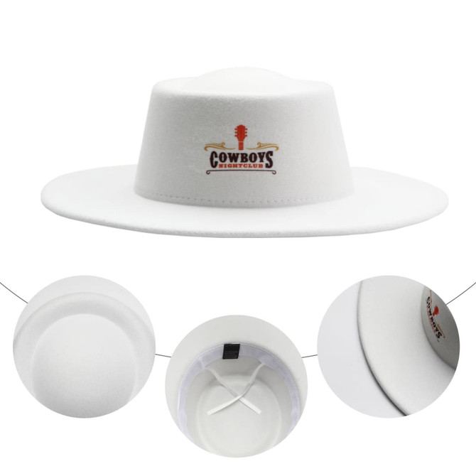 A white flat top felt fedora hat with a logo, featuring a wide brim and interior details.