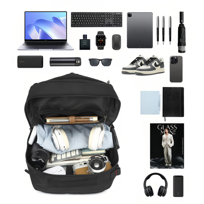 A black convertible backpack to duffel bag filled with a laptop, camera, headphones, notebooks, and various accessories.