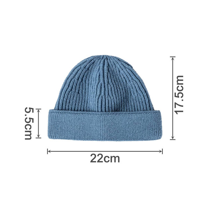 A round beanie in a blue hue, featuring a textured ribbed design and a rolled cuff. Dimensions are 22cm wide and 17.5cm tall.