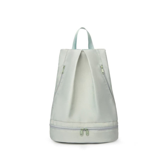 A pale green backpack with a dual zipper design, featuring a handle and a logo on the front.