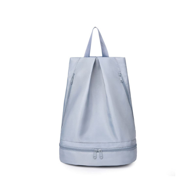 A light blue backpack with a handle and zippered compartments featuring a logo.