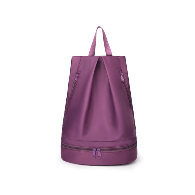 A purple backpack with dual zippered compartments and a handle on top. It features a sleek, modern design.
