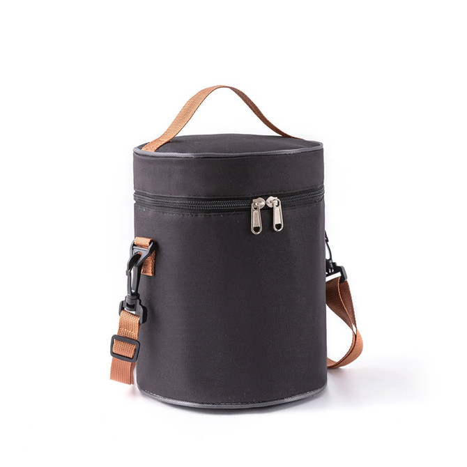 A cylindrical black lunch bag with a zipper closure and a detachable shoulder strap. It has a handle and branding.