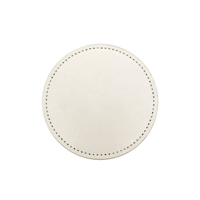 A round PU coaster in a light cream colour with decorative stitching around the edge and no visible branding.