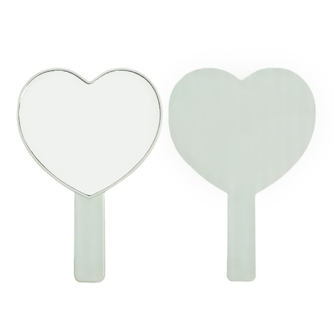 A heart-shaped handheld mirror with a silver handle. The mirror is reflective and features a smooth surface.