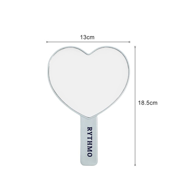 A heart-shaped handheld mirror with a white reflective surface and a handle, measuring 13cm by 18.5cm.