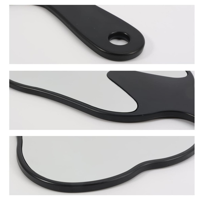 A tooth-shaped face mirror in black, featuring a smooth reflective surface and a hole for easy handling.